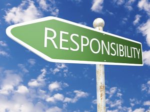 Responsibility - street sign illustration in front of blue sky with clouds.